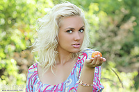 Blonde fitness happy nude girl outdoor