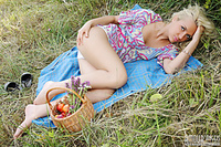 Blonde fitness happy nude girl outdoor