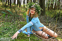 Tasteful art photo outdoor angel in the woods
