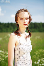 Ukranian fine lingerie poses outdoors