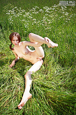 Ukranian fine lingerie poses outdoors