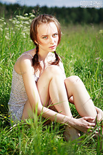 Ukranian fine lingerie poses outdoors
