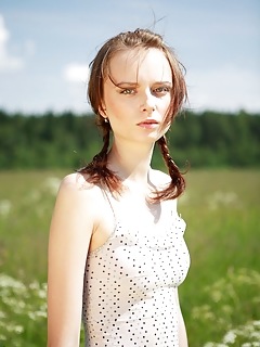 Ukranian fine lingerie poses outdoors