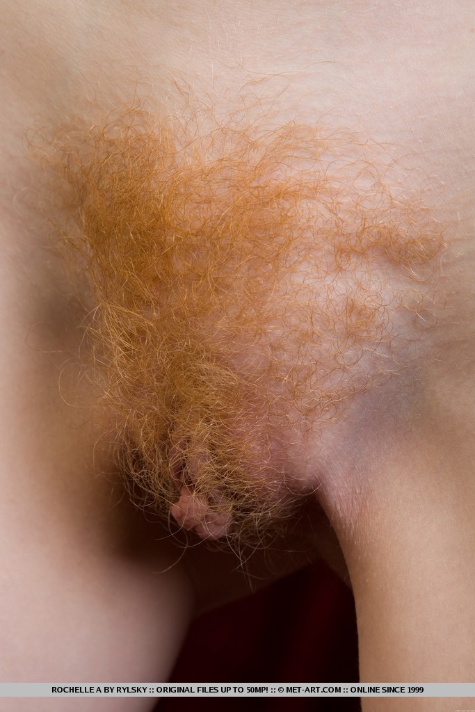 Angelic redhead with milky skin, cute face and natural beauty.